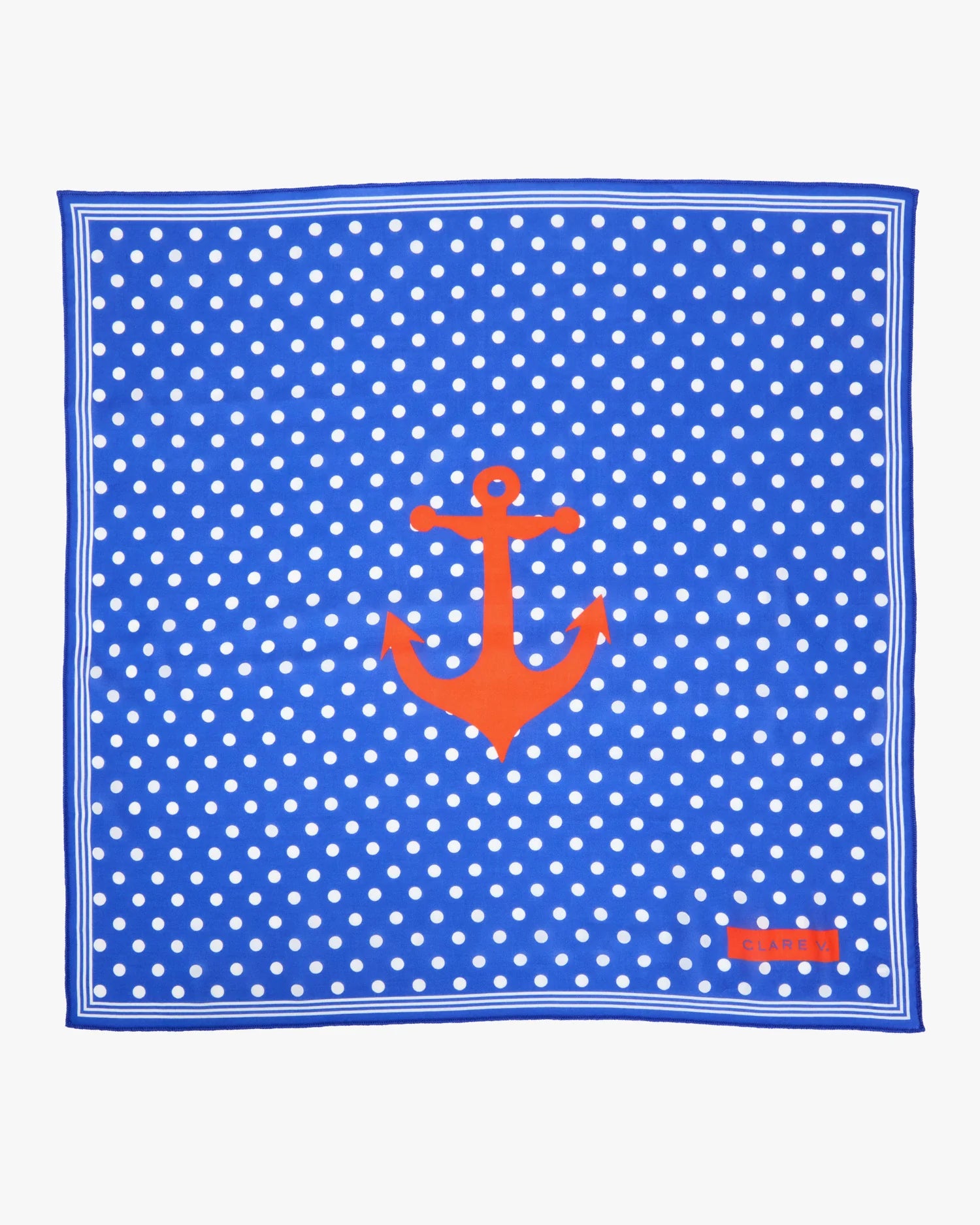 Blue polka dot pocket square with an orange anchor on a white background