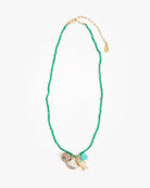 Necklace with shell charms on a white background