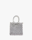 Small textured handbag on a white background