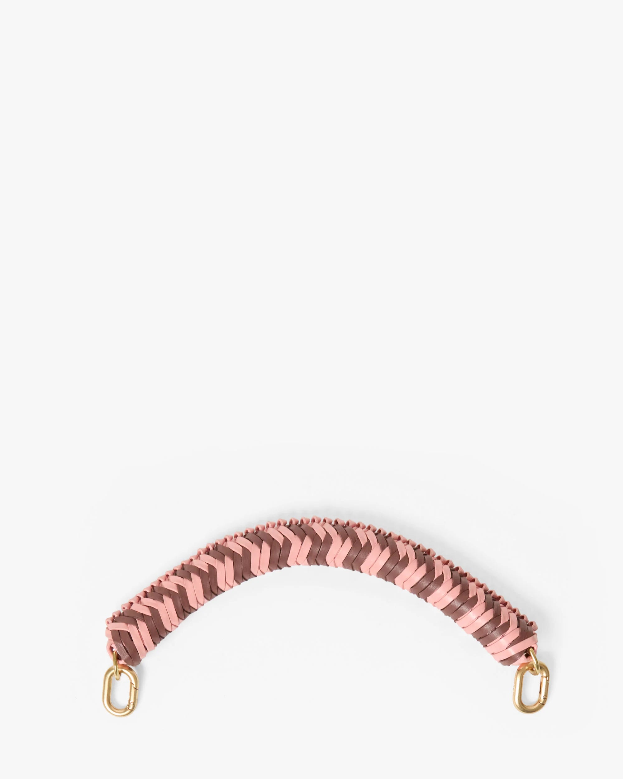 Patterned strap with gold hardware on a white background