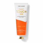 Chez Gagné 'Can't Touch This' hand cream tube in orange and white with gold lettering, shown on a clean white background with a soft shadow.
