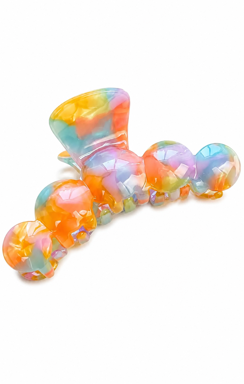 A translucent hair claw clip decorated with colorful, faceted skull details in a pastel tie-dye pattern of orange, pink, blue, and yellow, shown on a plain white background.