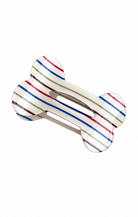 A bone-shaped hair claw clip with a white base decorated with thin red, blue, and gray stripes, shown on a plain white background.
