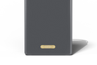 Dark gray bookend with a gold label on a white background