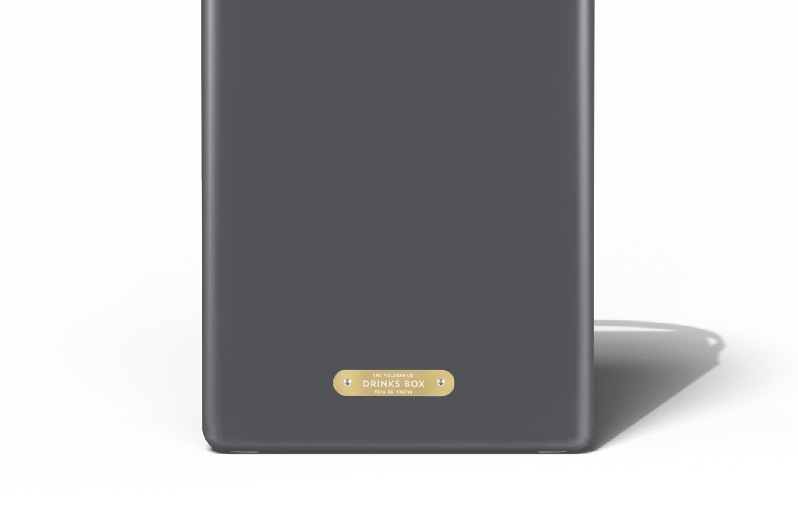 Dark gray bookend with a gold label on a white background