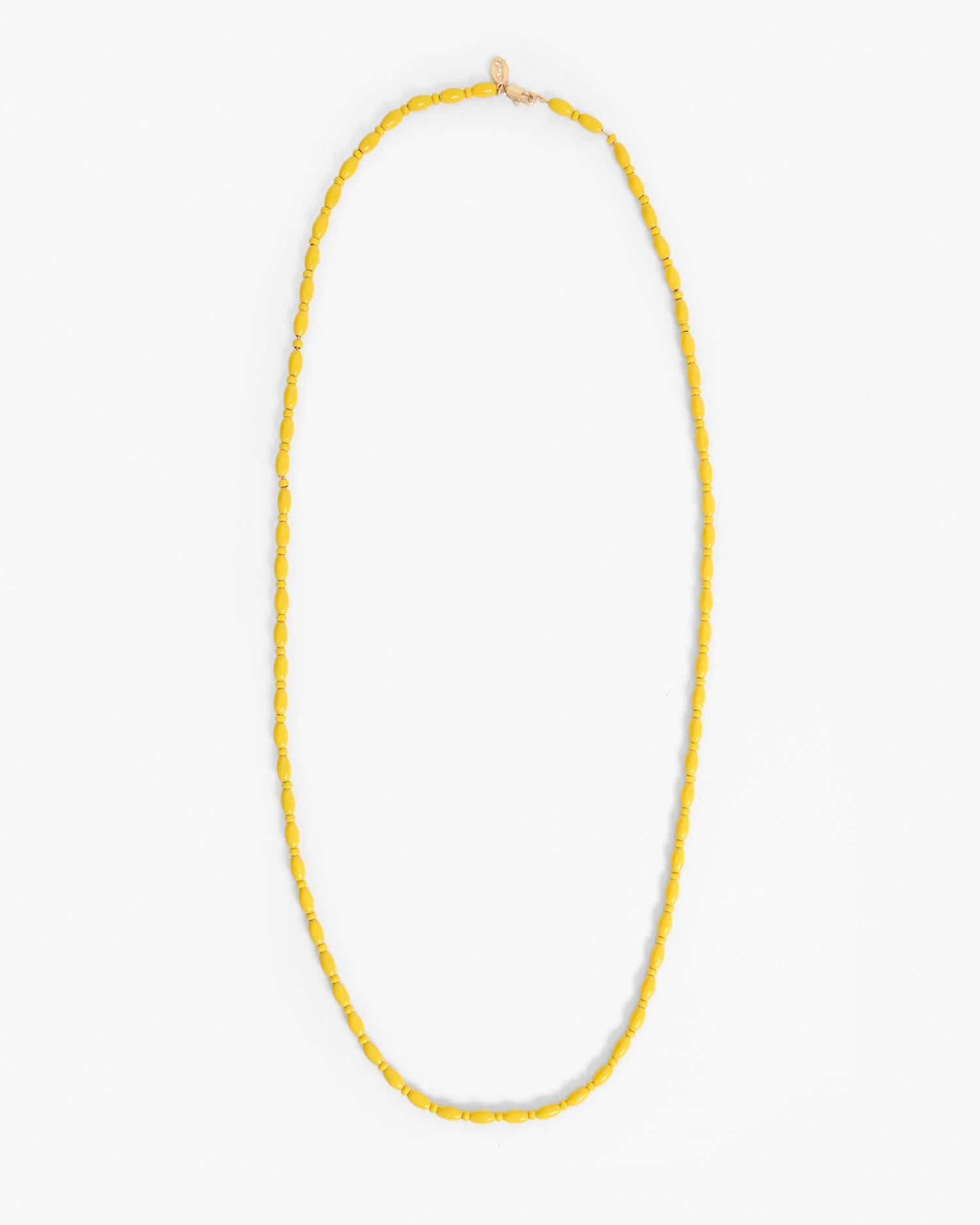 Yellow beaded necklace on a white background