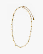 Necklace with white beads and gold accents on a white background