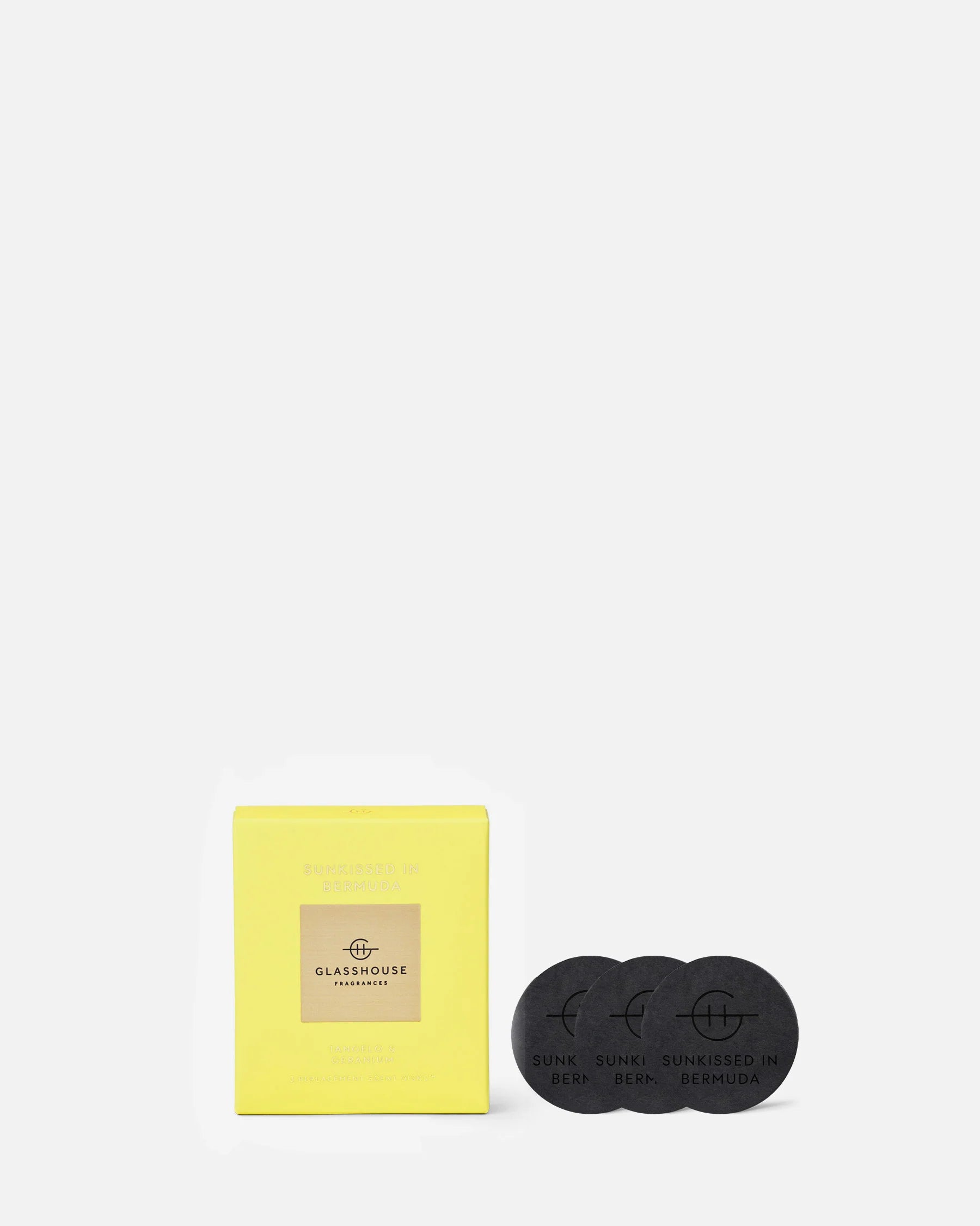 Yellow packaging box with black coasters on a white background
