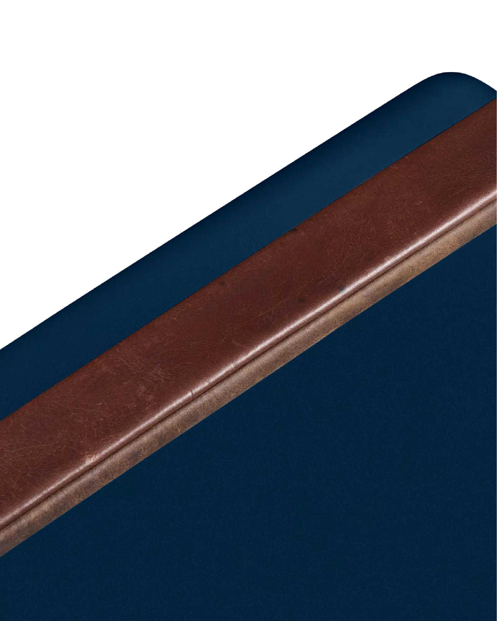 Close-up of a brown leather strip on a blue background
