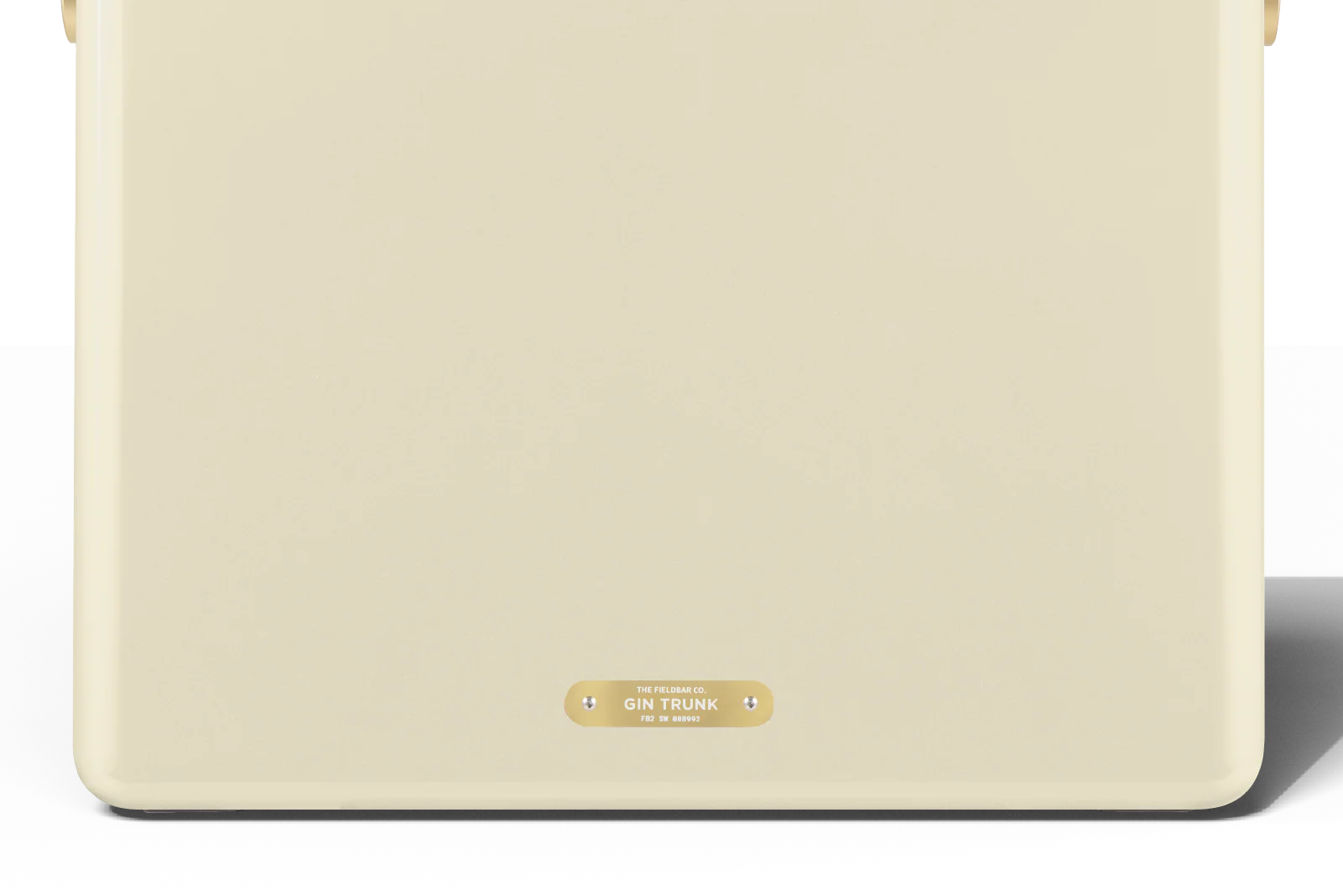 Beige laptop sleeve with a gold label on a white background