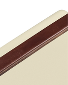 Brown and beige plastic strip on a beige background