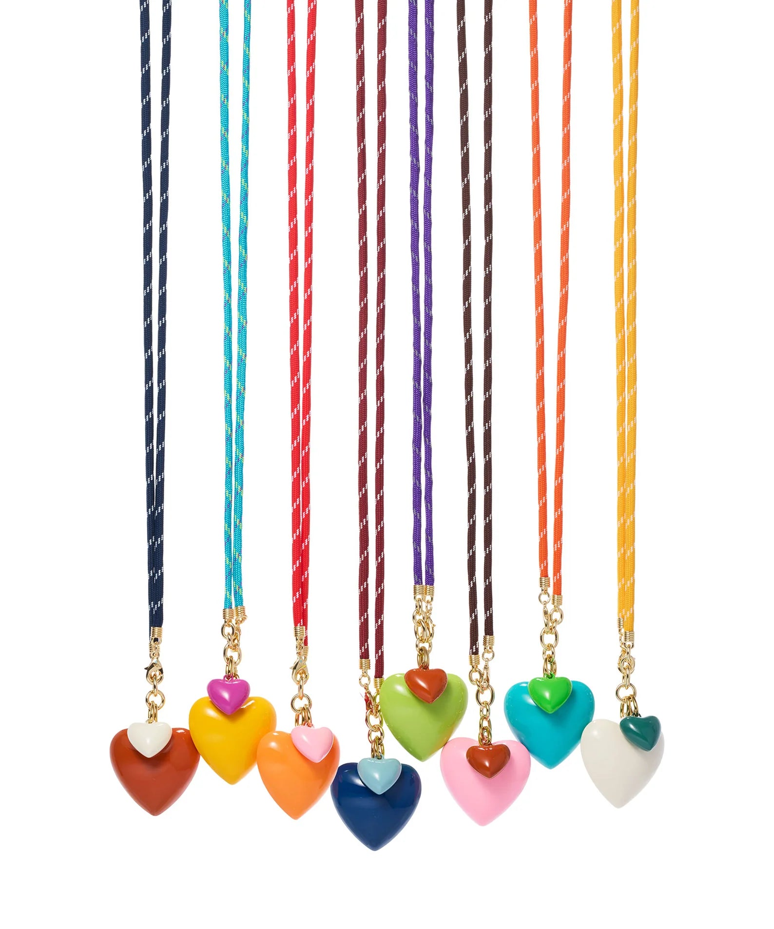 Set of colorful heart-shaped pendant necklaces on a white background