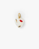 A small heart-shaped charm with a gold-tone loop at the top, featuring a glossy white enamel body decorated with a red lips motif, a small gold fish, and a small black-and-white pattern near the bottom, shown on a plain white background.