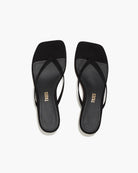 Black sandals with 'TKEES' branding on a white background