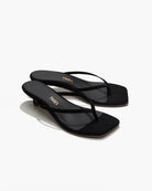 Black sandals with 'Keds' branding on a white background