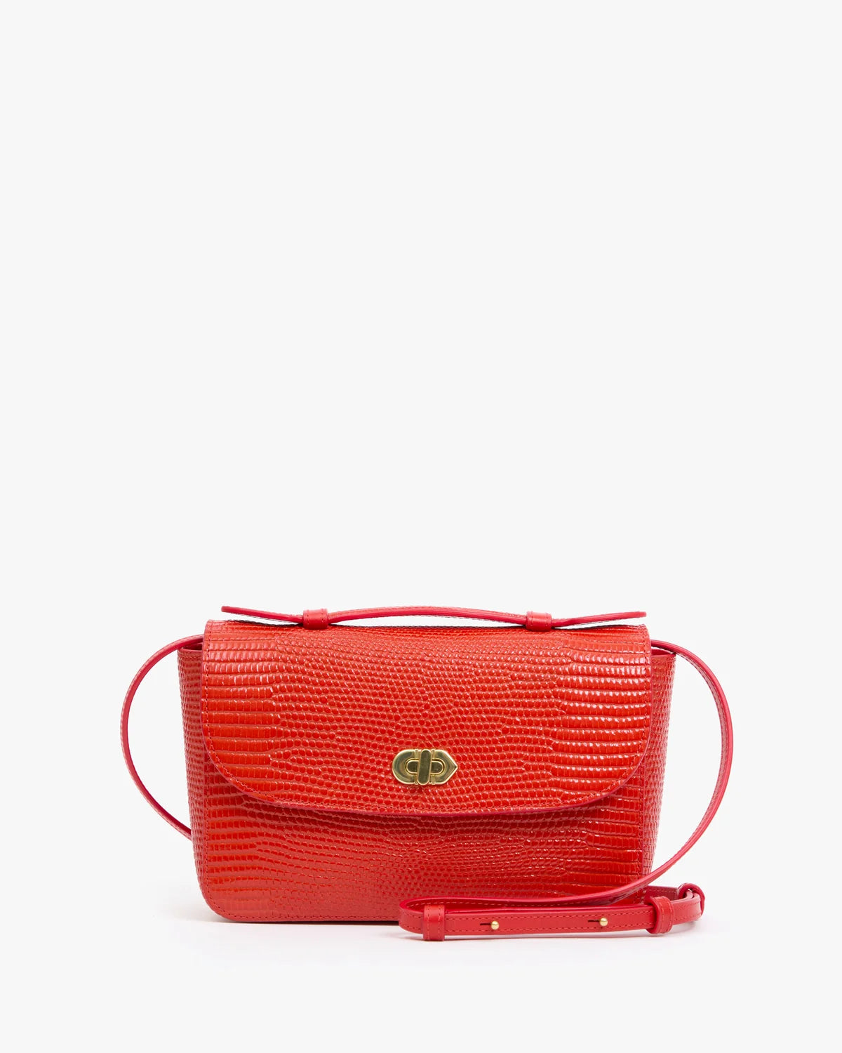 A bright red crocodile-embossed leather handbag with a top handle, a shoulder strap, and a gold-tone turn-lock closure on the front flap, shown against a plain white background.