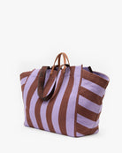 Striped tote bag with brown and purple stripes on a white background