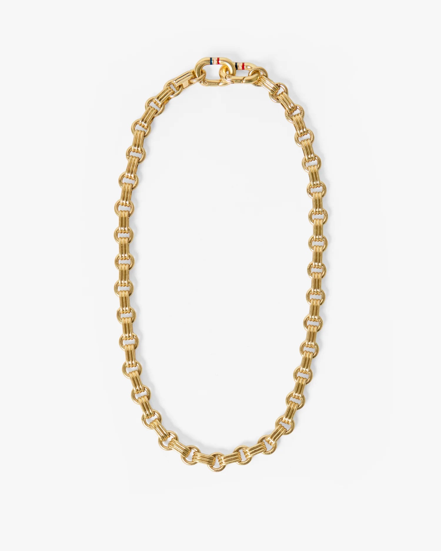 Gold chain necklace on a white background
