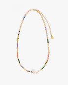 Necklace with colorful beads on a white background