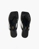 Black flip-flops with a brand logo on a white background