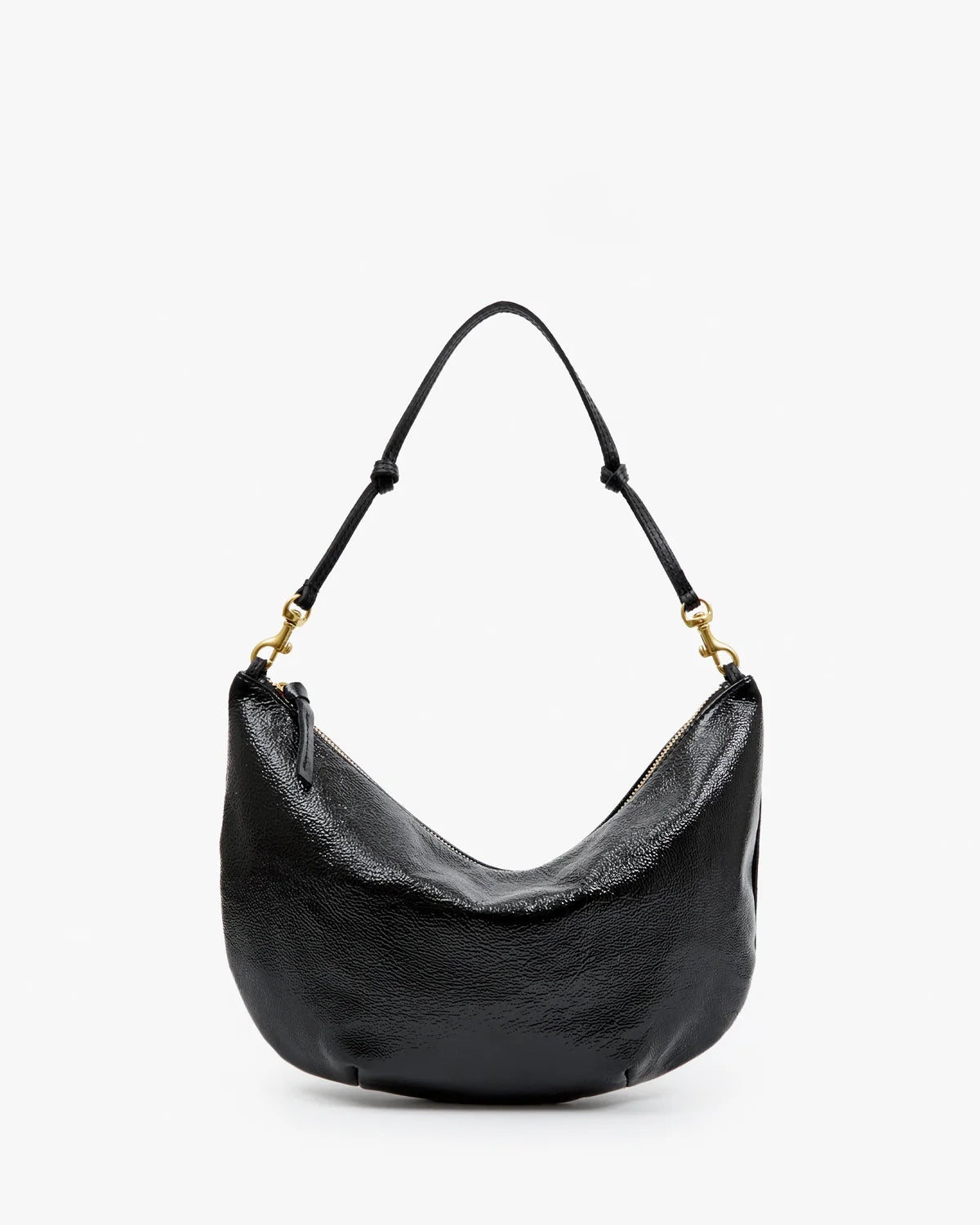 A black pebbled leather crescent-shaped shoulder bag with gold-tone hardware and a thin black strap, shown against a plain white background.