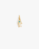 Ring with a large blue gemstone and intricate band on a white background