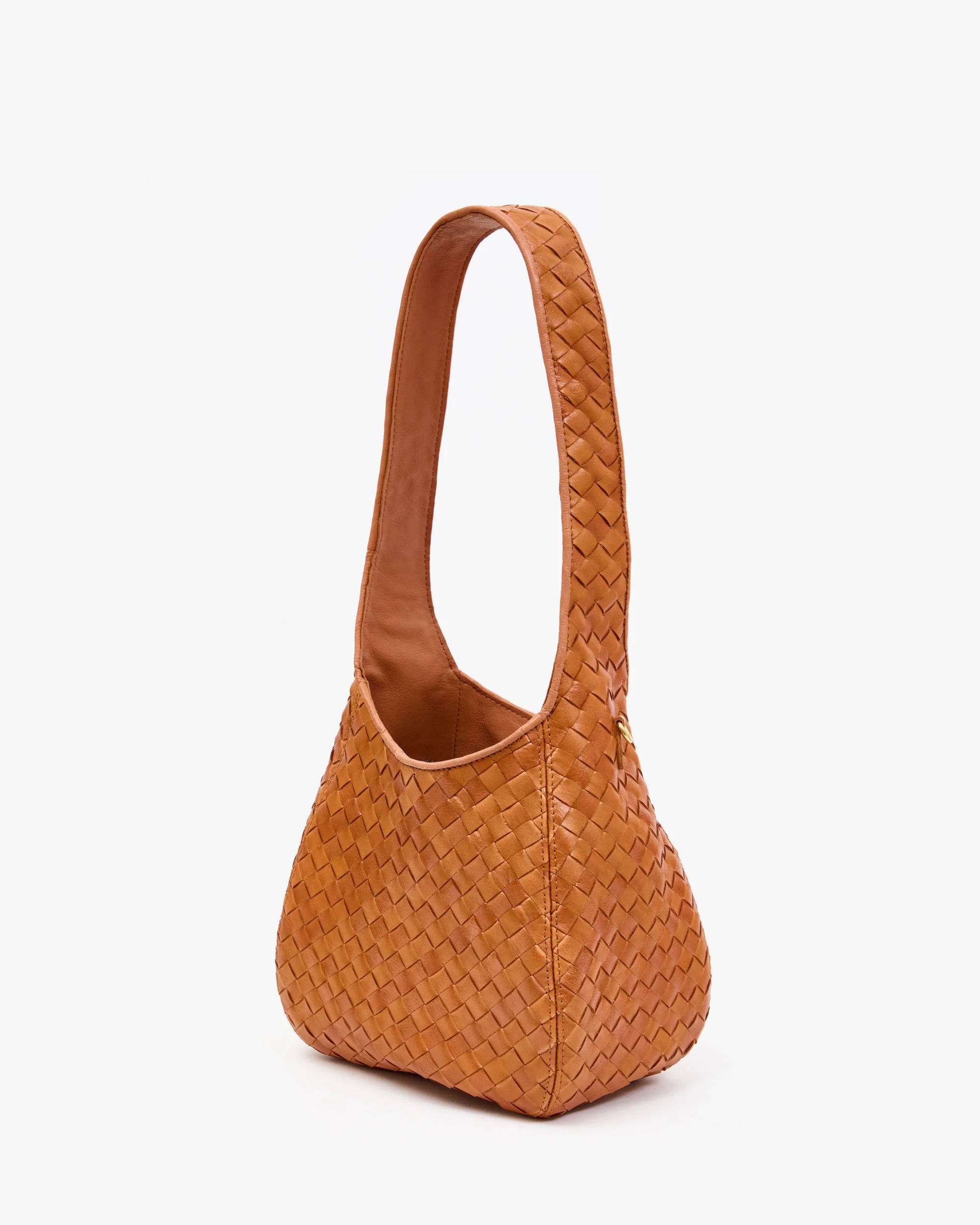 Brown woven handbag on a white background