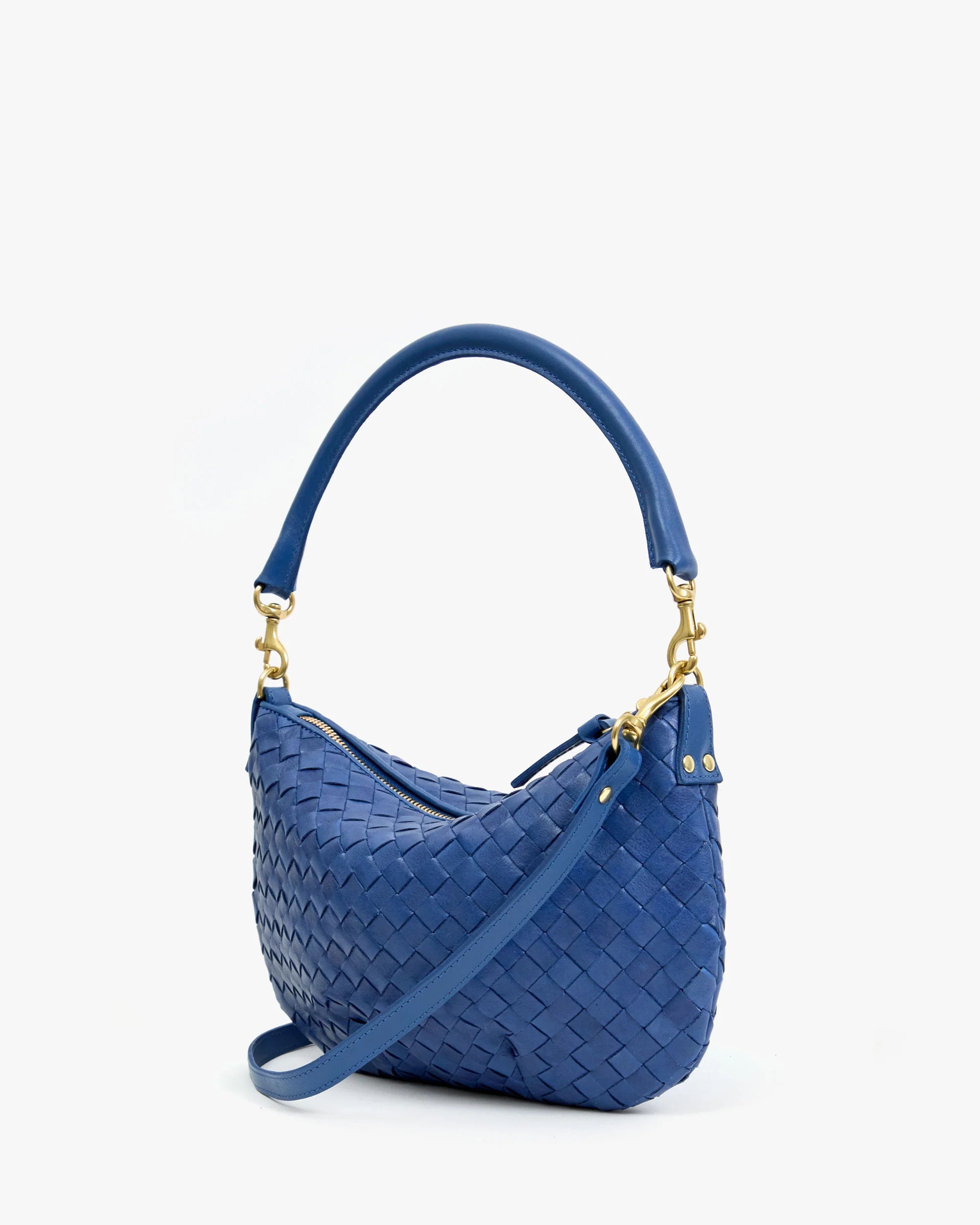 Blue woven handbag with gold accents on a white background