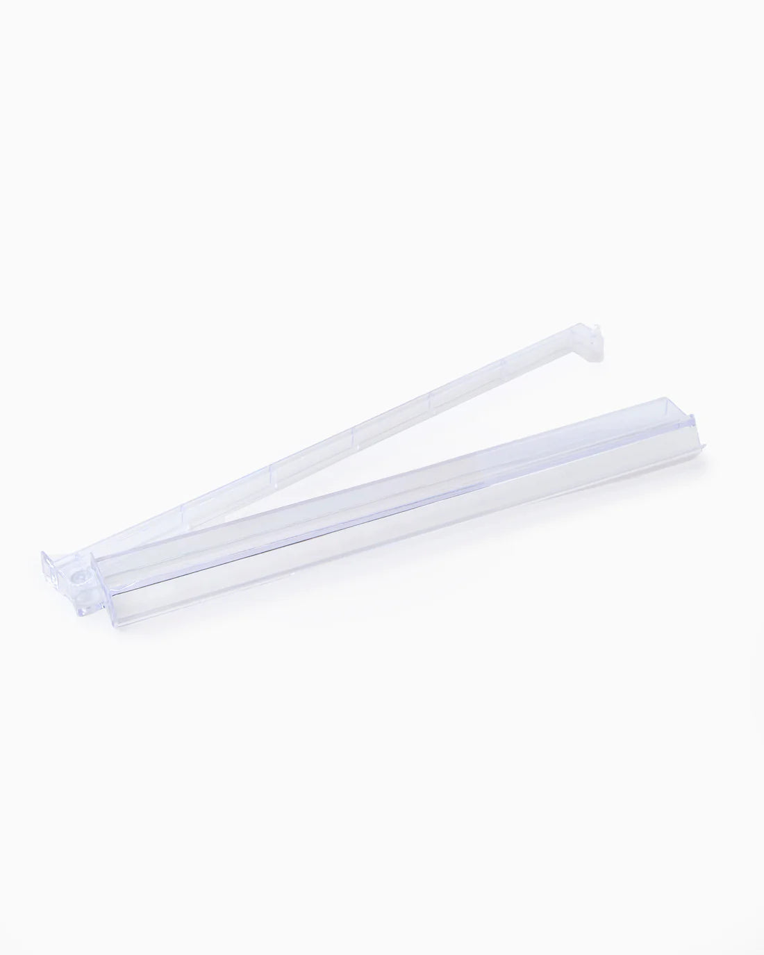 Two white plastic straws on a white background