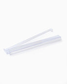 Two white plastic straws on a white background