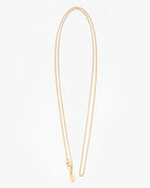 Gold necklace on a white background