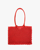 Red woven handbag on a white background