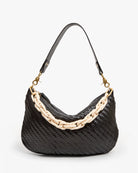 Black woven handbag with a beige chain handle on a white background