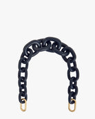 A chunky chain link belt in a dark navy blue finish with gold-toned metal hardware at the ends, displayed on a clean white background.