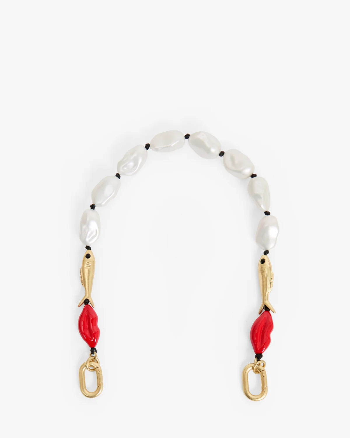 A beaded necklace featuring white baroque pearls, small black beads, gold-toned fish charms, and bright red leaf-shaped beads ending in gold O-rings, displayed on a clean white background.