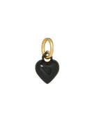 Black heart-shaped pendant with gold chain on a white background