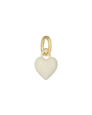Heart-shaped charm with gold ring on a white background