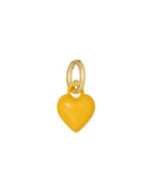 Heart-shaped charm with gold ring on a white background