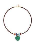 Necklace with a green heart-shaped pendant and colorful beads on a brown cord against a white background