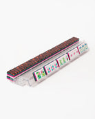 Rectangular container with patterned lid and base on a white background