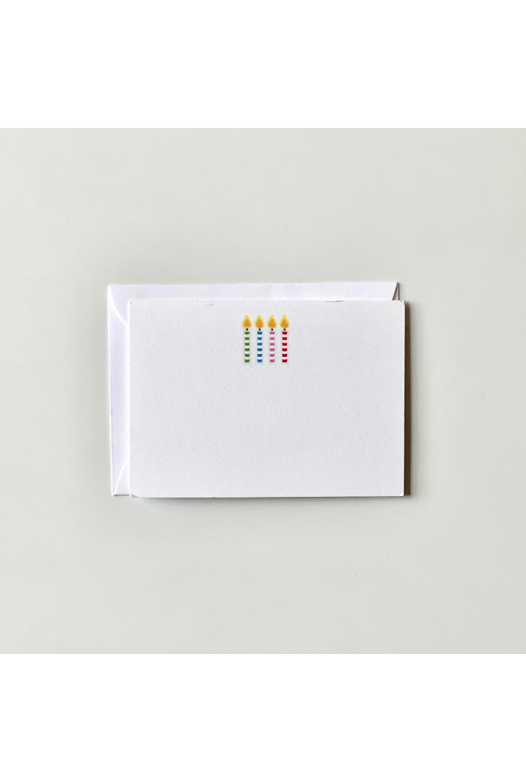 White card with colorful design on a light gray background