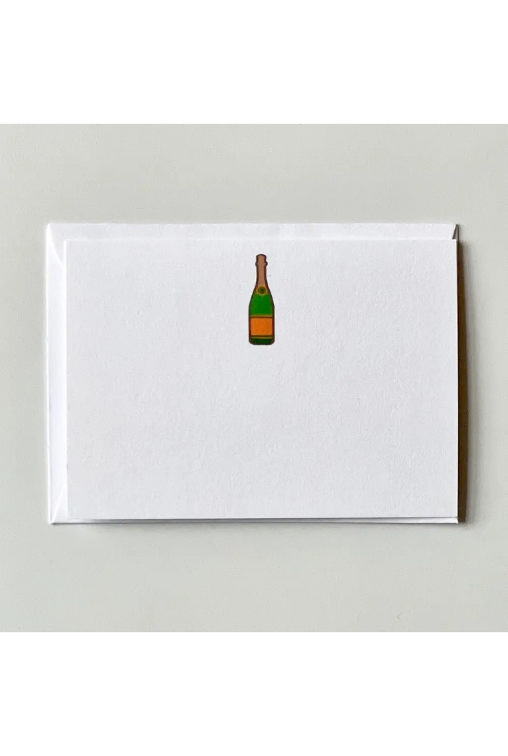 Notebook with a champagne bottle illustration on a white background
