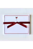 White card with red border and wine glass symbol, tied with a red ribbon on a white background