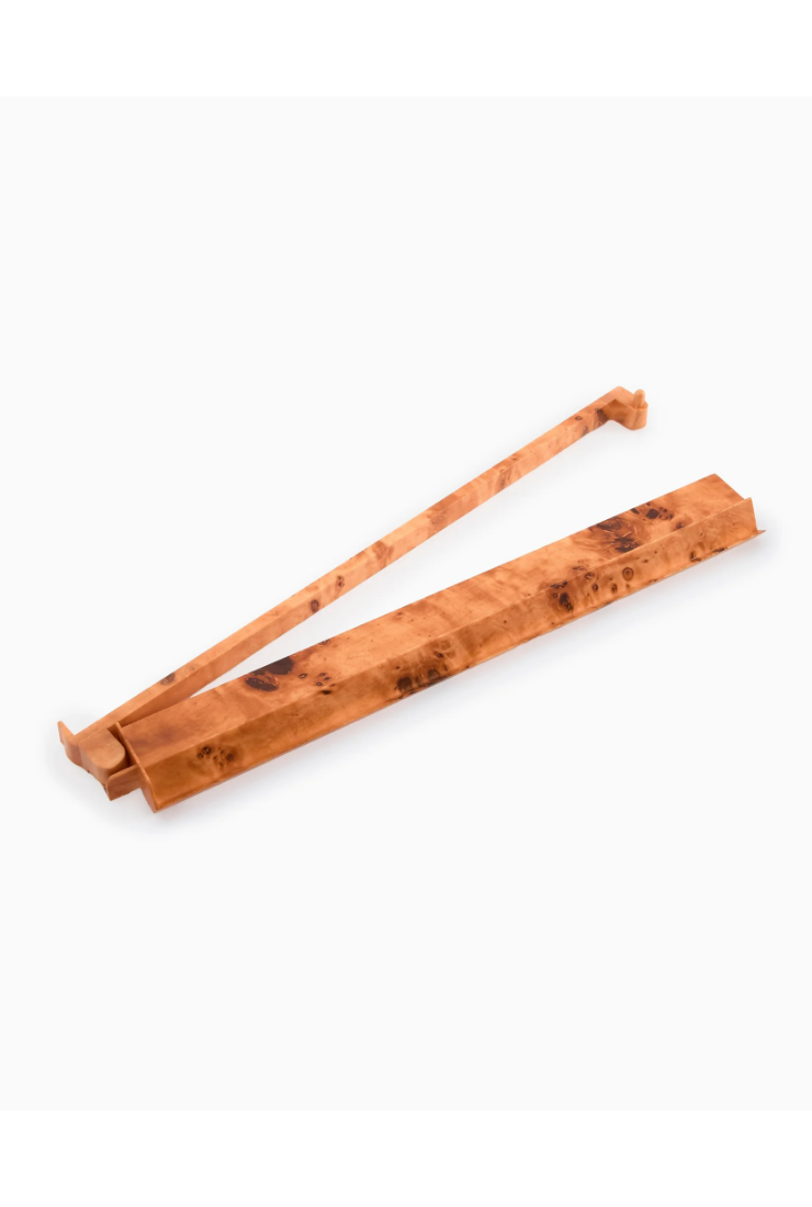 Wooden tongs on a white background