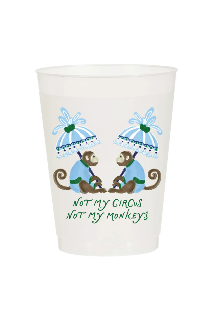 A clear plastic cup featuring a watercolor-style red monkey graphic on the front, and the text 'NOT MY CIRCUS NOT MY MONKEYS' printed on it, isolated on a white background.