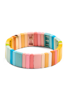 A pastel rainbow wooden bead stretch bracelet on a clean white background.