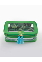 A green zippered cosmetic bag with a clear window showing a green botanical pattern inside, featuring gold-tone hardware and two blue tassel zipper pulls, on a light gray background.