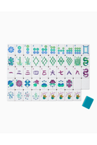 A set of Japanese mahjong tiles arranged in a grid on a white background, with a single blue tile placed to the lower right. The tiles feature various Japanese characters and patterns in blue, green, purple, and pink on a white base.