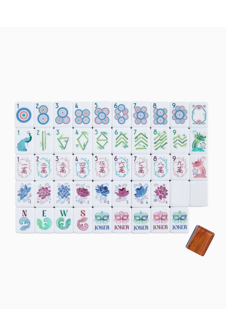 A set of Mahjong tiles arranged in a grid on a white background, with a small wooden box or container placed at the bottom right.
