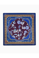 A square silk scarf featuring an intricate floral pattern in shades of blue, burgundy, and gold, presented flat against a clean white background.